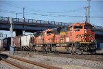 Grain train rolls east through University